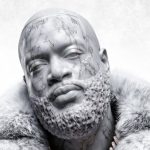 'Set In Stone' by Rick Ross album cover: marble statue of the artist wearing a fur coat and diamond chains