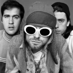 Kurt Cobain wearing white oval sunglasses and a trapper hat, flanked by Nirvana bandmates Krist Novoselic and Dave Grohl